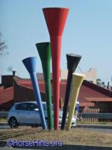 Vuvuzela Statue on street curb outside Mandela Museum